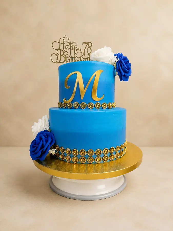 Blue and gold milestone birthday cake by Moh Bakes in Nairobi