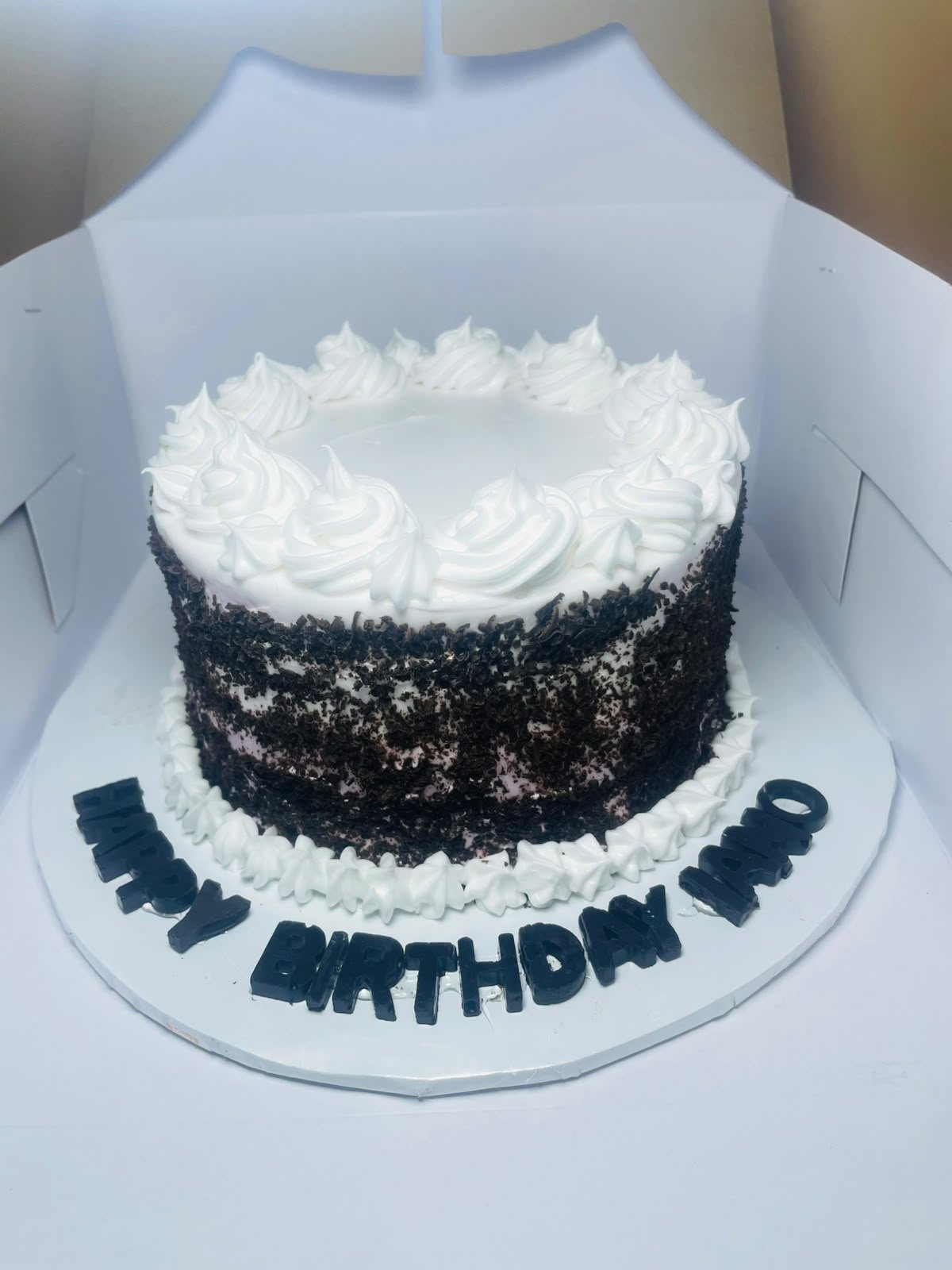 Elegant white custom heart cake by Moh Bakes