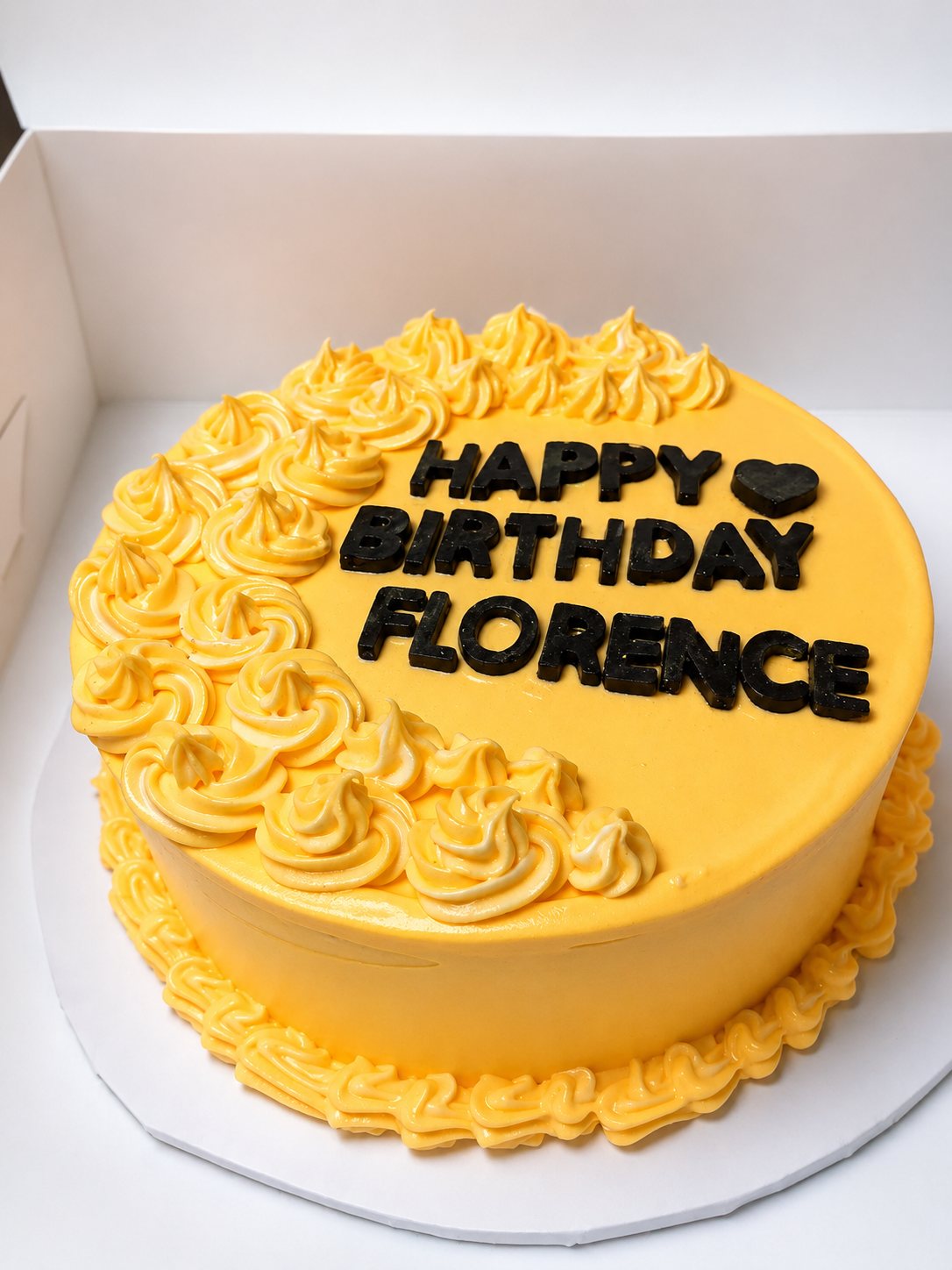 Yellow birthday cake by Moh Bakes for customers in Githurai Nairobi
