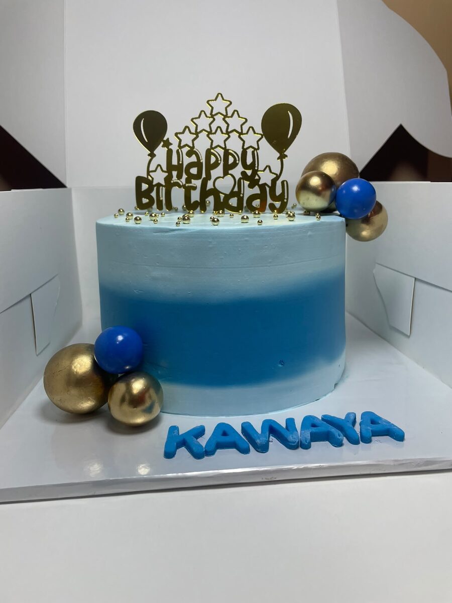 Blue and gold ombre birthday cake made by Moh Bakes & Treats