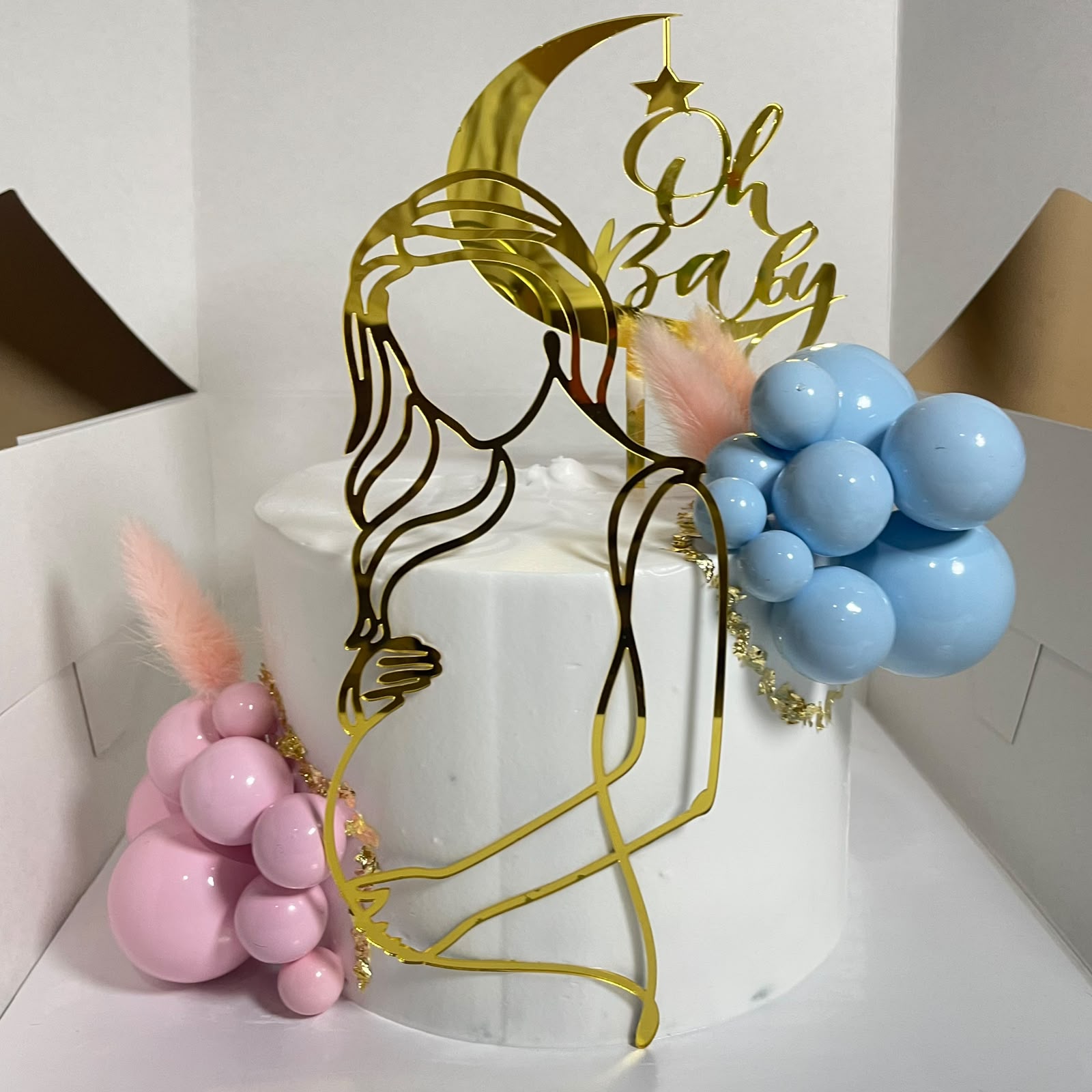 Blue and pink baby shower cake made by Moh Bakes & Treats in Nairobi
