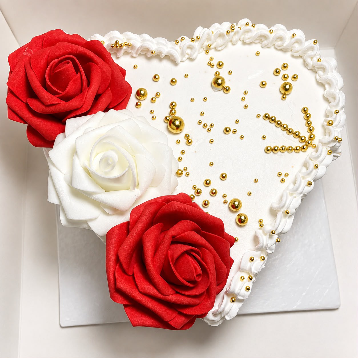Red and white rose heart cake made by Moh Bakes & Treats in Nairobi